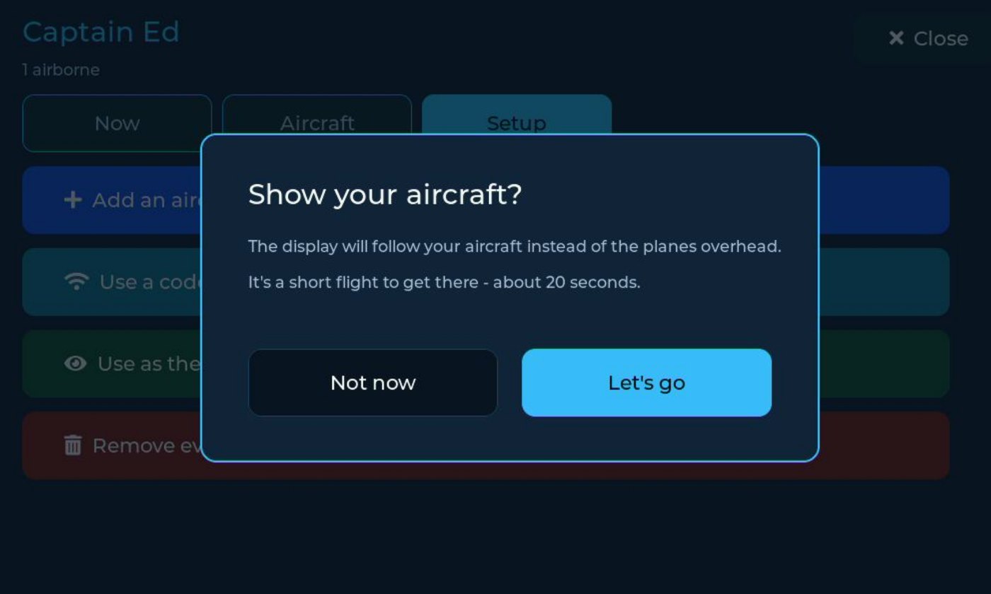 A confirmation reading Show your aircraft? The display will follow your aircraft instead of the planes overhead, with Not now and Let's go buttons.