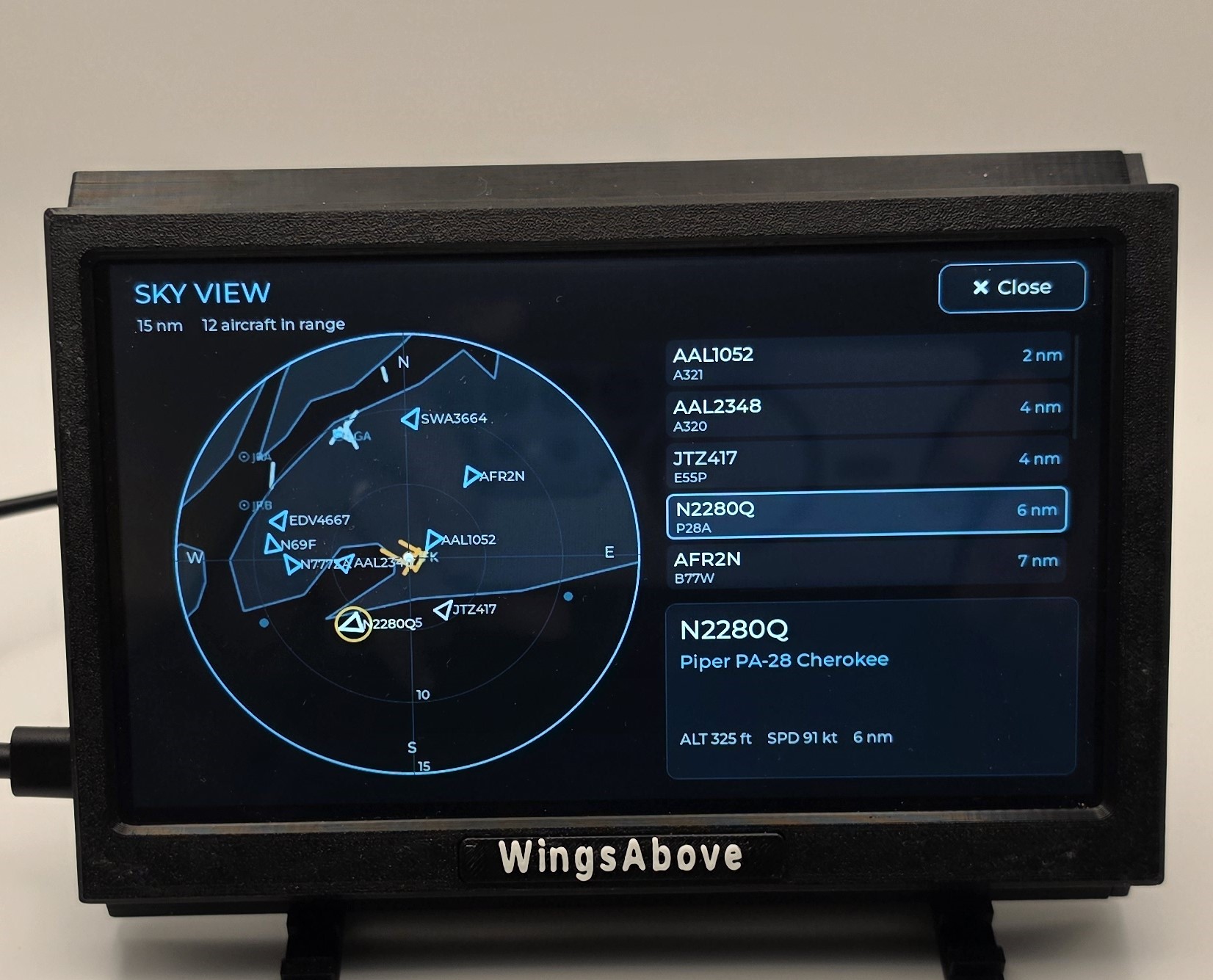 Sky View: a full-screen radar of every aircraft in range with a distance-sorted list